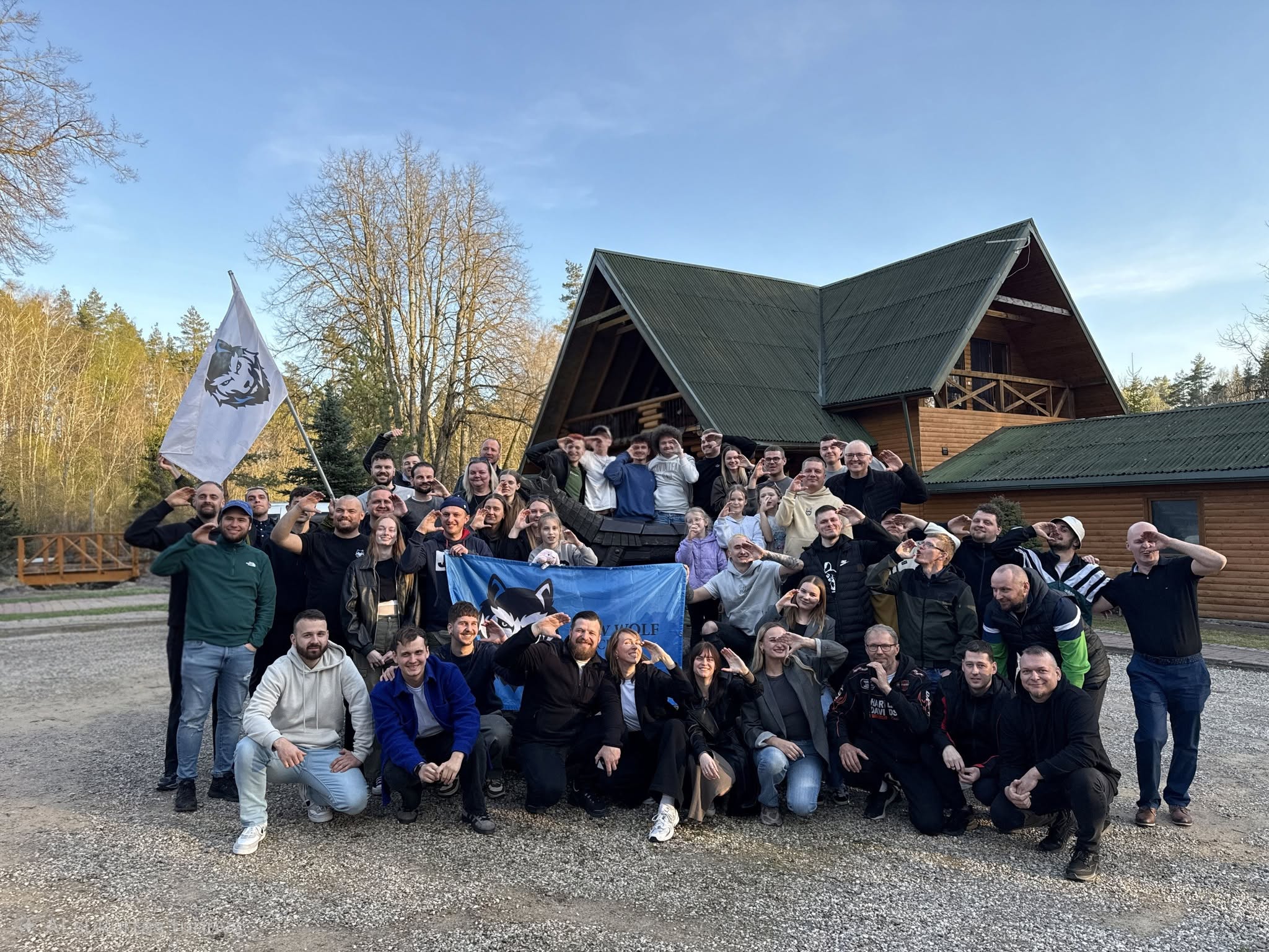 Club members together with BMW Wolf Club flags